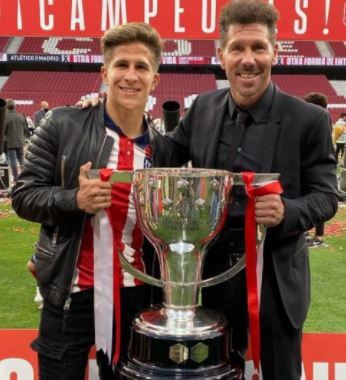 Giuliano Simeone with his father Diego Simeone.